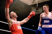 23 January 2015; Roy Sheehan, left, St. Michaels Boxing Club/Defence Forces, celebrates after his victory over Matthew Tinker, St. Francis Boxing Club, Limerick, during their 81 kg bout. National Elite Boxing Championship Finals. National Stadium, Dublin. Picture credit: Cody Glenn / SPORTSFILE