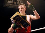 23 January 2015; Brendan Irvine, St. Paul's Boxing Club, Antrim, celebrates victory over Hugh Myers, St. Brigid's Boxing Club, Kildare, following their 49 kg bout. National Elite Boxing Championship Finals. National Stadium, Dublin. Picture credit: Cody Glenn / SPORTSFILE