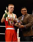 23 January 2015; Kurt Walker, Canal Boxing Club, Lisburn, receives trophy, belt and certificate after being declared winner over Sean Higginson (not pictured), St. John Bosco Boxing Club, Belfast, after their 56 kg bout. National Elite Boxing Championship Finals. National Stadium, Dublin. Picture credit: Cody Glenn / SPORTSFILE