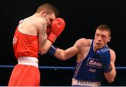 23 January 2015; Ray Moylette, right, St. Anne's Boxing Club, Mayo, exchanges punches with Dean Walsh, St. Joseph's Boxing Club/St. Iban's Boxing Club, Wexford, during their 64 kg bout. National Elite Boxing Championship Finals. National Stadium, Dublin. Picture credit: Cody Glenn / SPORTSFILE