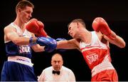 23 January 2015; Sean McComb, right, Holy Trinity Boxing Club, Belfast, exchanges punches with George Bates, St. Mary's Boxing Club, Dublin, during their 60 kg bout. National Elite Boxing Championship Finals. National Stadium, Dublin. Picture credit: Cody Glenn / SPORTSFILE