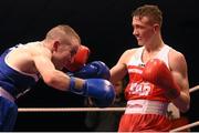 23 January 2015; Brendan Iirvine, right, St. Paul's Boxing Club, Antrim, exchanges punches with Hugh Myers, St. Brigid's Boxing Club, Kildare, during their 49 kg bout. National Elite Boxing Championship Finals. National Stadium, Dublin. Picture credit: Cody Glenn / SPORTSFILE