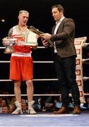 23 January 2015; Roy Sheehan, St. Michaels Boxing Club/Defence Forces, receives trophy, belt and certificate from Kenny Egan after victory over Matthew Tinker, St. Francis Boxing Club, Limerick, in their 81 kg bout. National Elite Boxing Championship Finals. National Stadium, Dublin. Picture credit: Cody Glenn / SPORTSFILE