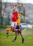 24 January 2015; Cian McCarthy, Cork, wins possession ahead of Cian Dillon, Clare. Waterford Crystal Cup, Semi-Final, Cork v Clare, Mallow, Co. Cork. Picture credit: Diarmuid Greene / SPORTSFILE