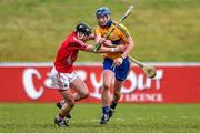 24 January 2015; Bobby Duggan, Clare, in action against Andy Walsh, Cork. Waterford Crystal Cup, Semi-Final, Cork v Clare, Mallow, Co. Cork. Picture credit: Diarmuid Greene / SPORTSFILE