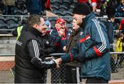 24 January 2015; Clare manager Davy Fitzgerald, left, and Cork manager Jimmy Barry Murphy exchange a handshake after the game. Waterford Crystal Cup, Semi-Final, Cork v Clare, Mallow, Co. Cork. Picture credit: Diarmuid Greene / SPORTSFILE