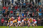 24 January 2015; Some of the 1,369 spectators in attendance look on as Cork and Clare players tussle for possession. Waterford Crystal Cup, Semi-Final, Cork v Clare, Mallow, Co. Cork. Picture credit: Diarmuid Greene / SPORTSFILE
