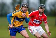 24 January 2015; Patrick Donnellan, Clare, in action against Brian O'Sullivan, Cork. Waterford Crystal Cup, Semi-Final, Cork v Clare, Mallow, Co. Cork. Picture credit: Diarmuid Greene / SPORTSFILE