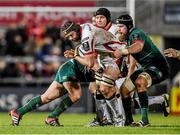 24 January 2015; Iain Henderson, Ulster, is tackled by Tom Youngs, left, and Sebastian De Chaves, Leicester Tigers. European Rugby Champions Cup 2014/15, Pool 3, Round 6, Ulster v Leicester Tigers, Kingspan Stadium, Ravenhill Park, Belfast, Co. Antrim. Picture credit: Ramsey Cardy / SPORTSFILE