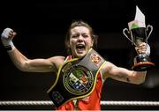 24 January 2015; Lauren Hogan, St Brigids, Co. Offaly, celebrates victory over Maeve Clarke, Ballinacarrow, Co. Sligo, during their 48 kg Light-flyweight bout. National Elite Boxing Championship Finals, National Stadium, Dublin. Picture credit: Pat Murphy / SPORTSFILE