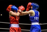 24 January 2015; Lauren Hogan, St Brigids, Co. Offaly, left, exchanges punches with Maeve Clarke, Ballinacarrow, Co. Sligo, during their 48 kg Light-flyweight bout. National Elite Boxing Championship Finals, National Stadium, Dublin. Picture credit: Pat Murphy / SPORTSFILE