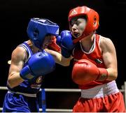 24 January 2015; Lauren Hogan, St Brigids, Co. Offaly, right, exchanges punches with Maeve Clarke, Ballinacarrow, Co. Sligo, during their 48 kg Light-flyweight bout. National Elite Boxing Championship Finals, National Stadium, Dublin. Picture credit: Pat Murphy / SPORTSFILE