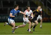 24 January 2015; Mark Donnelly, Tyrone, in action against Damien O'Reilly, Cavan. McKenna Cup Final, Tyrone v Cavan, Athletic Grounds, Armagh. Picture credit: Oliver McVeigh / SPORTSFILE