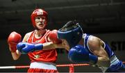 24 January 2015; Dervla Duffy, St Brigids / Defence Forces, Kildare, right, exchanges punches with Joanne Lambe, Carrickmacross, Monaghan, during their 57 kg Featherweight bout. National Elite Boxing Championship Finals, National Stadium, Dublin. Picture credit: Pat Murphy / SPORTSFILE