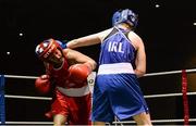 24 January 2015; Louise Donohue, Geesala, right, exhanges punches with Debbie O'Reilly, Olympic,  during their 60 kg bout. National Elite Boxing Championship Finals, National Stadium, Dublin. Picture credit: Piaras Ó Mídheach / SPORTSFILE
