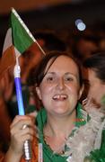 2 October 2007; Rosie Maguire, a Team 2007 volunteer, from Belcoo, Co. Fermanagh, awaits the arrival of Team Ireland into the stadium during the opening ceremony of the 2007 Special Olympics World Summer Games, Shanghai Stadium, Shanghai, China. Picture credit: Ray McManus / SPORTSFILE