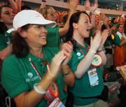 2 October 2007; Team 2007 volunteers Adrienne Murphy, left, Balbriggan, Dublin, and Natasha Langdon, Ballina, Co. Mayo, await the arrival of TEAM Ireland into the stadium during the opening ceremony of the 2007 Special Olympics World Summer Games, Shanghai Stadium, Shanghai, China. Picture credit: Ray McManus / SPORTSFILE