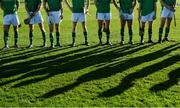 21 October 2017; A detailed view of the shadows of the Ireland players as they line up before the U21 Shinty International match between Ireland and Scotland at Bught Park in Inverness, Scotland. Photo by Piaras Ó Mídheach/Sportsfile