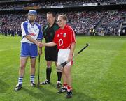 29 July 2007; Waterford captain Michael Walsh and Cork captain Joe Deane shake hands in front of referee Brian Gavin. Guinness All-Ireland Senior Hurling Championship Quarter-Final, Cork v Waterford, Croke Park, Dublin. Picture credit; Ray McManus / SPORTSFILE