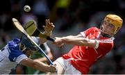 23 January 2015; Winning image from Sportsfile at the Professional Photographers Association of Ireland - Photographer of the Year Awards 2015. 2nd Sports Action - BIG CLEARANCE - Ray McManus.   13 July 2014; The Limerick goalkeeper Eoghan McNamara clears under pressure from Waterford corner forward Patrick Curran. Electric Ireland Munster GAA Hurling Minor Championship Final, Limerick v Waterford, Pairc Uí Chaoimh, Cork. Picture credit: Ray McManus / SPORTSFILE