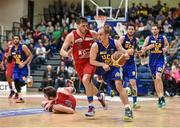 24 January 2015; Barry Drumm, UCD Marian, in action against Kyle Hosford, C&S UCC Demons. Basketball Ireland Men's National Cup Final, UCD Marian v C&S UCC Demons, National Basketball Arena, Tallaght, Dublin. Picture credit: Barry Cregg / SPORTSFILE