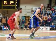 24 January 2015; Barry Drumm, UCD Marian, in action against Kyle Hosford, C&S UCC Demons. Basketball Ireland Men's National Cup Final, UCD Marian v C&S UCC Demons, National Basketball Arena, Tallaght, Dublin. Picture credit: Barry Cregg / SPORTSFILE