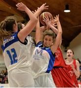 24 January 2015; Haley Lenihan, Glanmire BC, supported by team-mates Jane Fitzgerald, 12, and Sarah Kenny, in action against Rachel Huijsdens, DCU Mercy. Basketball Ireland Women's U18 National Cup Final, DCU Mercy v Glanmire BC, National Basketball Arena, Tallaght, Dublin. Picture credit: Piaras O Midheach / SPORTSFILE