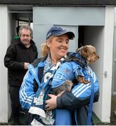 25 January 2015; Yvonne Clarke, from Coolock, with her dog Marley before the game. Bord na Mona O'Byrne Cup Final, Kildare v Dublin, St Conleth's Park, Newbridge, Co. Kildare. Picture credit: Piaras Ó Mídheach / SPORTSFILE