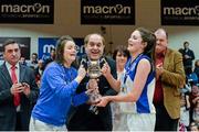 24 January 2015; Glanmire BC captain Sarah Kenny, right, and injured player Olivia Dupuy are presented with the cup by Gerry Kelly, President, Basketball Ireland. Basketball Ireland Women's U18 National Cup Final, DCU Mercy v Glanmire BC, National Basketball Arena, Tallaght, Dublin. Picture credit: Piaras O Midheach / SPORTSFILE