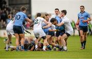 25 January 2015; Dublin's Dean Rock and Kildare's Fionn Dowling, bottom, involved in a tussle off the ball,  for which Rock was shown a yellow card. Bord na Mona O'Byrne Cup Final, Kildare v Dublin, St Conleth's Park, Newbridge, Co. Kildare. Picture credit: Piaras Ó Mídheach / SPORTSFILE