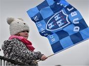 25 January 2015; Dublin supporter Caragh Watson, aged five, from Seville Place, flies her flag ahead of the game. Bord na Mona O'Byrne Cup Final, Kildare v Dublin, St Conleth's Park, Newbridge, Co. Kildare. Picture credit: Ray McManus / SPORTSFILE
