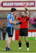 25 January 2015; Referee David Gough shows Dublin's Michael Darragh Macauley the red card in the closing minutes of normal time. Bord na Mona O'Byrne Cup Final, Kildare v Dublin, St Conleth's Park, Newbridge, Co. Kildare. Picture credit: Piaras Ó Mídheach / SPORTSFILE