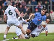 25 January 2015; Dublin's Kevin McManamon is tackled by Kildare players Mick O'Grady, left, and Kevin Murnaghan. A penalty was awarded as a result of the tackle. Bord na Mona O'Byrne Cup Final, Kildare v Dublin, St Conleth's Park, Newbridge, Co. Kildare. Picture credit: Ray McManus / SPORTSFILE
