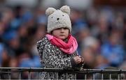 25 January 2015; Five year old Dublin supporter Caragh Watson, from Seville Place, watches the game. Bord na Mona O'Byrne Cup Final, Kildare v Dublin, St Conleth's Park, Newbridge, Co. Kildare. Picture credit: Ray McManus / SPORTSFILE