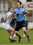 25 January 2015; Michael Darragh Macauley, Dublin, in action against Daryl O'Brien, Kildare. Bord na Mona O'Byrne Cup Final, Kildare v Dublin, St Conleth's Park, Newbridge, Co. Kildare. Picture credit: Piaras Ó Mídheach / SPORTSFILE