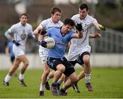 25 January 2015; Michael Darragh Macauley, Dublin,is tackled by Kildare's Gavin Farrell, left, and Fionn Dowling. Bord na Mona O'Byrne Cup Final, Kildare v Dublin, St Conleth's Park, Newbridge, Co. Kildare. Picture credit: Ray McManus / SPORTSFILE