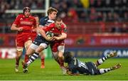 25 January 2015; Andrew Conway, Munster, is tackled by Nathan Fowles, left, and Luke McLean, Sale Sharks. European Rugby Champions Cup 2014/15, Pool 1, Round 6, Munster v Sale Sharks. Thomond Park, Limerick. Picture credit: Diarmuid Greene / SPORTSFILE