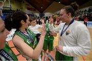 25 January 2015; 2 year old Rian O'Sullivan, son of  Portlaoise Panters BC coach Peter O'Sullivan and being held by Portlaoise Panters BC captain Catherine O'Sullivan, gives a high five to Kelsey Wolfe, Portlaoise Panters BC, after the game. Basketball Ireland Senior Women's Cup Final, Oblate Dynamos v Portlaoise Panthers BC. National Basketball Arena, Tallaght, Dublin. Photo by Sportsfile