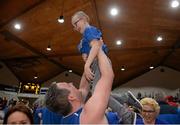 25 January 2015; Shane McCarthy, C&S Blue Demons, celebrates with his son Brendan after the game. Basketball Ireland President's Cup Final, C&S Blue Demons v SSE Airtricity Moycullen. National Basketball Arena, Tallaght, Dublin. Photo by Sportsfile