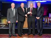 23 January 2015; Ray Byrne, from Wicklow, second right, is presented with his Croke Park Voluntary Stewards award by, from left, Chief Steward Michael Leddy, Uachtarán Chumann Lúthchleas Gael Liam Ó Néill and Ard Stiúrthóir of GAA Páraic Duffy during the Croke Park Annual Stewards Dinner. Croke Park, Dublin. Picture credit: Tomas Greally / SPORTSFILE