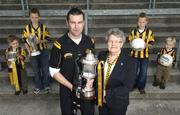 10 October 2007; Current All-Ireland Club Champions Crossmaglen Rangers were recognised for their contribution to Club Football at the official launch of the 2007/8 AIB Club Championships. Crossmaglen have claimed four AIB All-Ireland Club Titles in the last ten years. Photographed at the club grounds is 2007 winning captain Oisin McConville with his mother Margaret, and nephews, from left, Dara, age 3, Oisin age 11, Rian, age 10, and Aaron, age 2. Crossmaglen Rangers Oliver Plunkett Park, Co. Armagh. Picture credit: Brian Lawless / SPORTSFILE