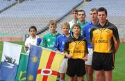 8 October 2007; From left, Mayo and Connacht footballer Ronan McGarrity, Laois and Leinster hurler James Young, Waterford and Munster hurler Eoin Kelly and Tyrone and Ulster footballer Conor Gormley with children from left, Ajwad Rziza, Connacht, Filip Flejsierowicz, Leinster, Mattie Hewelt, Munster and Patrick Mikolajozak, Ulster, at the launch of the 2007 M Donnelly Inter-Provincial Championships. This year the finals of the M Donnelly Inter-Provincial Championships will take place under lights in Croke Park on Saturday, October 27th. The first semi-final between Munster and Leinster will take place in Fermoy on Saturday October 13th and the second semi-final between Ulster and Connacht will be held on Saturday October 20th in Ballybofey. Croke Park, Dublin. Photo by Sportsfile