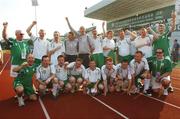 10 October 2007; Members of the victorious Team Ireland soccer team and their coaches. The team is, back row left to right, Gareth Egan, from Lifford, Co. Donegal, Ken Elliott, Clondalkin, Dublin, Noel Daly, Crumlin, Dublin, Oliver Boyle, Letterkenny, Co. Donegal, Philip Dunne, Tallaght, Dublin, Mark Duffy, Tallaght, Dublin, Adrian Clarke, Manor Cunningham, Co. Donegal, Francis Bilardi, Tallaght, Dublin, Ryan Doherty, Omagh, Co. Tyrone, front row left to right, Darren Flanagan, Curragh, Co. Kildare, John Cousins, Tallaght, Co Dublin, Michael O'Reilly, Kilbarrack, Dublin, Darren Farrelly, Portarlington, Co. Laois, Chris O'Donnell, Letterkenny, Co. Donegal, Daniel Sands, Inchicore, Dublin, after defeating France in a final. 2007 Special Olympics World Summer Games, Shanghai Songjiang Stadium, Shanghai, China. Picture credit: Ray McManus / SPORTSFILE