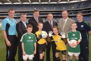 10 October 2007; John McGuinness, T.D., third from right, Minister for Trade and Commerce, with, from left, Dan Connor, Drogheda United Goalkeeper, Paul Brady, FAI, Packie Bonner, Technical Director FAI, Enda McDonnell, Director of Standards with the NSAI and Ash Dyer, U17 Womens International Goalkeeper, with, front from left, Belvidere Youth Club's Shane Convy, Jayne Eyre, Aoife Gavin and Cian Fay, at the  launch of the Goalpost Safety Standards by NSAI & National Awareness Campaign by the FAI, IRFU, GAA and Cumann Camogie. Croke Park, Dublin. Picture credit: Matt Browne / SPORTSFILE