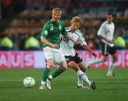 13 October 2007; Andy Keogh, Republic of Ireland, in action against Simon Rolfes, Germany. 2008 European Championship Qualifier, Republic of Ireland v Germany, Croke Park, Dublin. Picture credit; Pat Murphy / SPORTSFILE
