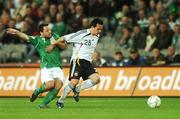 13 October 2007; Piotr Trochowski, Germany, in action against Andy Reid, Republic of Ireland. 2008 European Championship Qualifier, Republic of Ireland v Germany, Croke Park, Dublin. Picture credit; Paul Mohan / SPORTSFILE