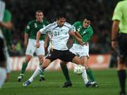 13 October 2007; Kevin Kuranyi, Germany, in action against Joey O'Brien, Republic of Ireland. 2008 European Championship Qualifier, Republic of Ireland v Germany, Croke Park, Dublin. Picture credit; Brian Lawless / SPORTSFILE