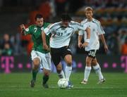 13 October 2007; Kevin Kuranyi, Germany, in action against Andy Reid, Republic of Ireland. 2008 European Championship Qualifier, Republic of Ireland v Germany, Croke Park, Dublin. Picture credit; Pat Murphy / SPORTSFILE