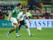 13 October 2007; Stephen Kelly, Republic of Ireland, in action against Clemens Fritz, Germany. 2008 European Championship Qualifier, Republic of Ireland v Germany, Croke Park, Dublin. Picture credit; Paul Mohan / SPORTSFILE