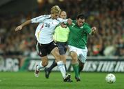 13 October 2007; Andy Reid, Republic of Ireland, in action against Simon Rolfes, Germany. 2008 European Championship Qualifier, Republic of Ireland v Germany, Croke Park, Dublin. Picture credit; Paul Mohan / SPORTSFILE